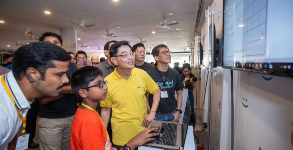 Code in the Community graduate Ramakrishnan Sanjit presenting his project to DPM Heng Swee Keat (Image courtesy of Google)